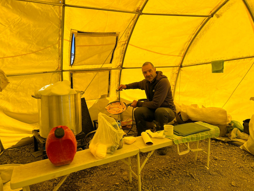 Guide, Cacho Beiza cooking up a warm meal!