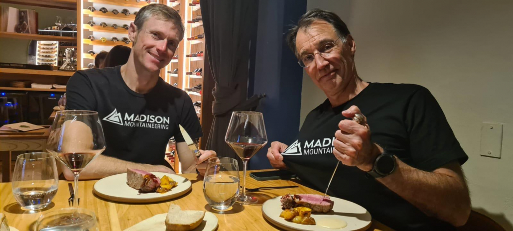 Fueling up with steak and wine before the upcoming climb!