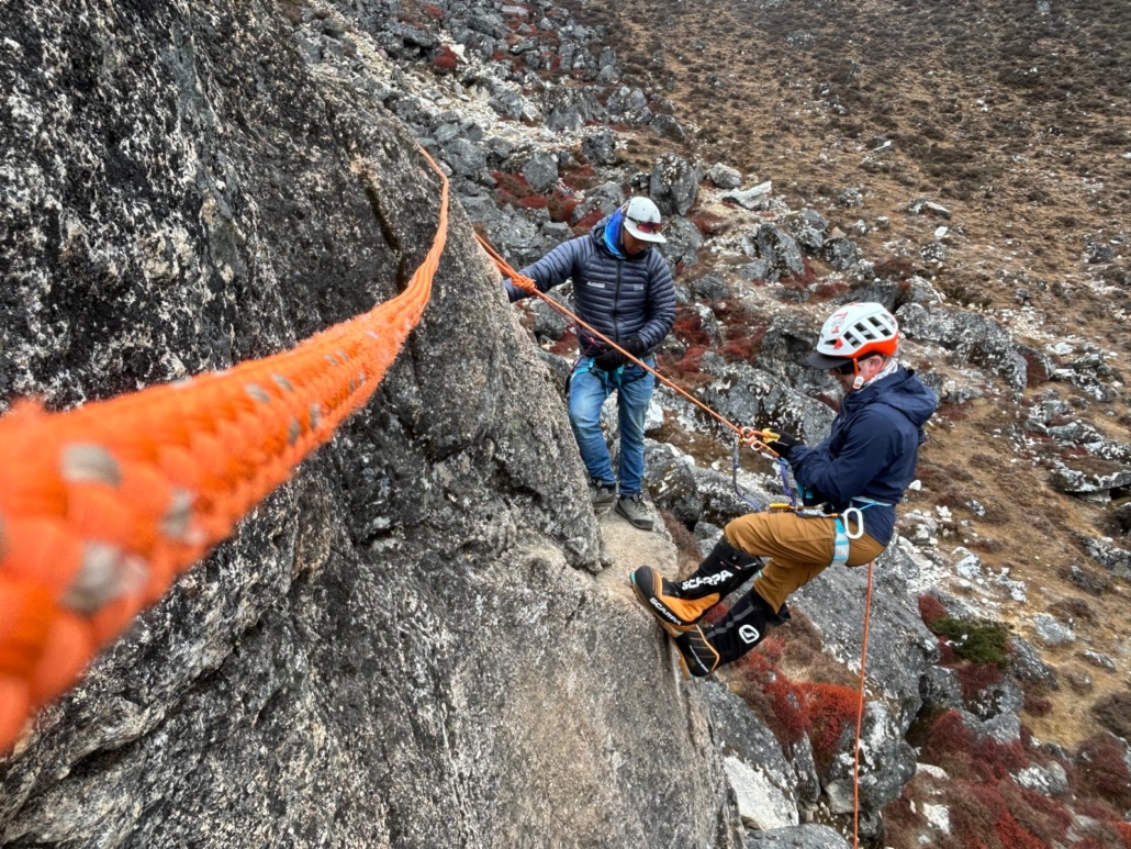 Our climber, Tom, practicing technical skills with sirdar and guide Aang Phurba Sherpa! (Photo by Terray Sylvester)