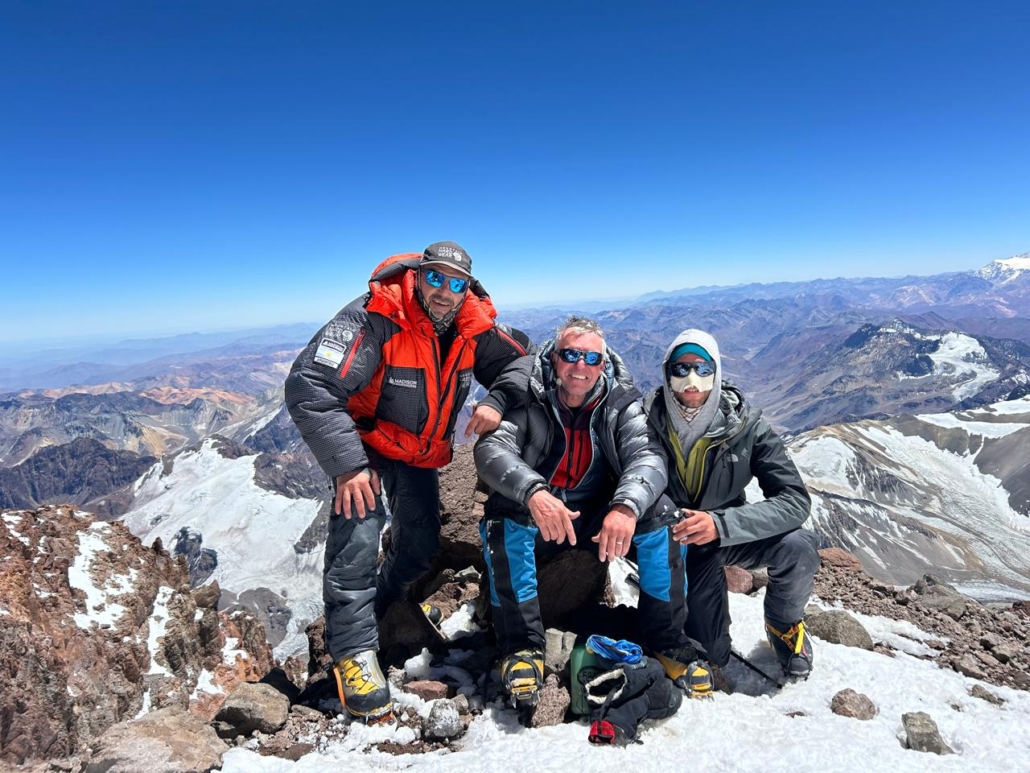 Our guide team, including Ed Viesturs on the summit on February 6, 2025.